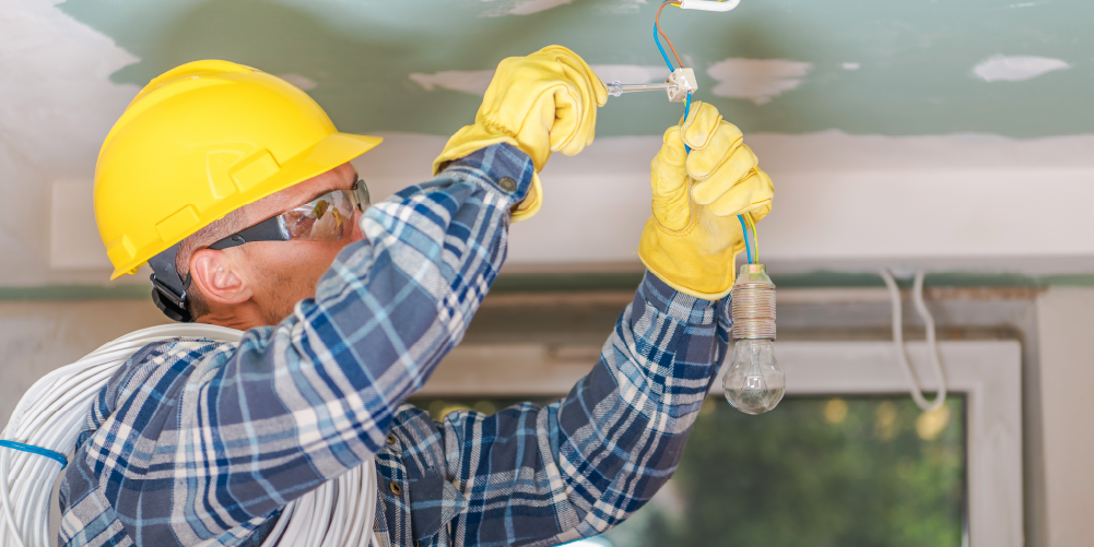 Professional electrician working on home electrical repair